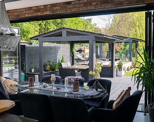 Home extension with grey bifold doors