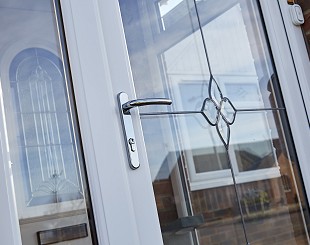 UPVC back door with decorative glass panel