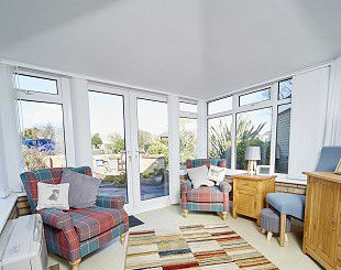 Interior of plastered ceiling on solid conservatory roof