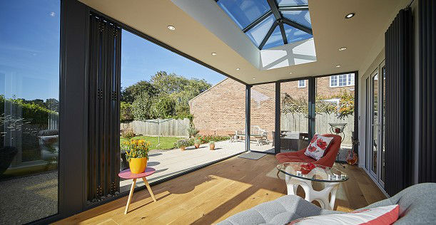 Bifold doors in home extension with roof lantern