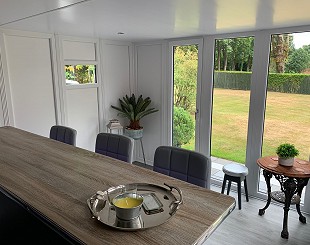 White UPVC-clad garden room