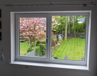 Internal view of white UPVC tilt and turn window