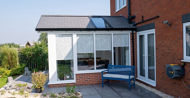 UPVC conservatory with solid tiled roof