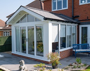 Conservatory with solid tiled roof