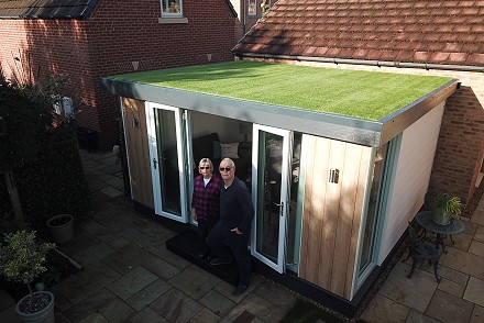 Couple delighted with new garden room which replaces rotten timber summerhouse