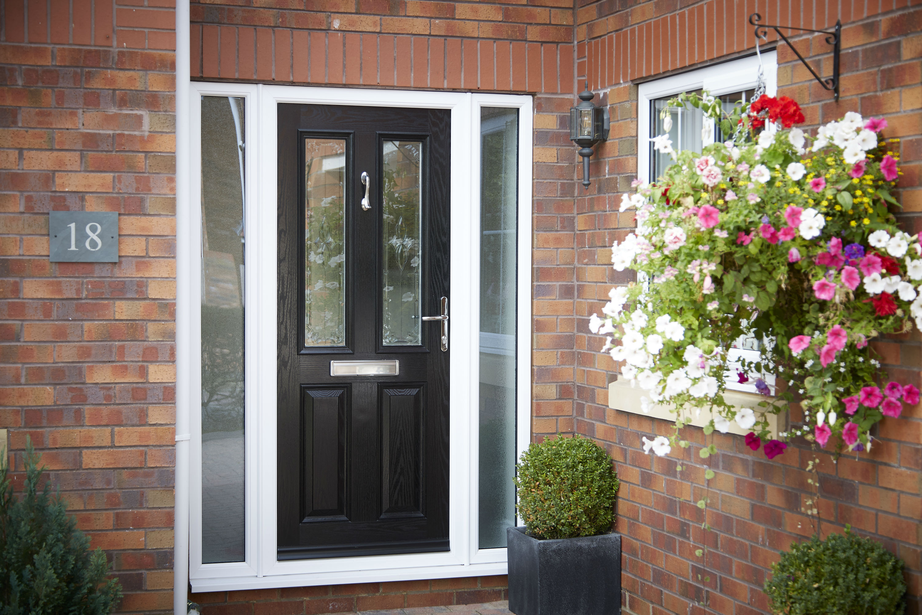 Front door   composite door in black with side panels