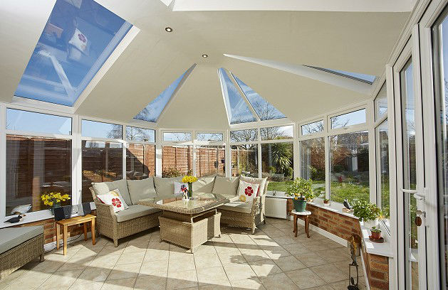 Conservatory roof with glass panels