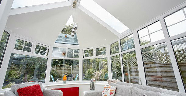 Conservatory with solid roof