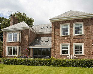 Sliding sash windows on traditional style home