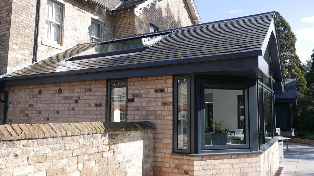 Grey aluminium windows in a modern house