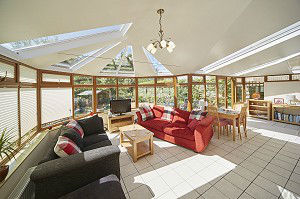 Inside a conservatory with an EYG solid tiled roof