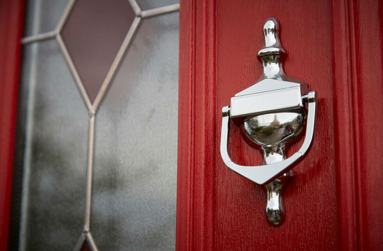 Red composite door by EYG with silver knocker