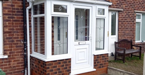 White UPVC front door in porch